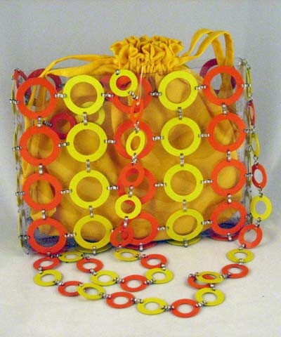 Orange and Yellow Metal Fashion Bag on sportingdirectory.com.au